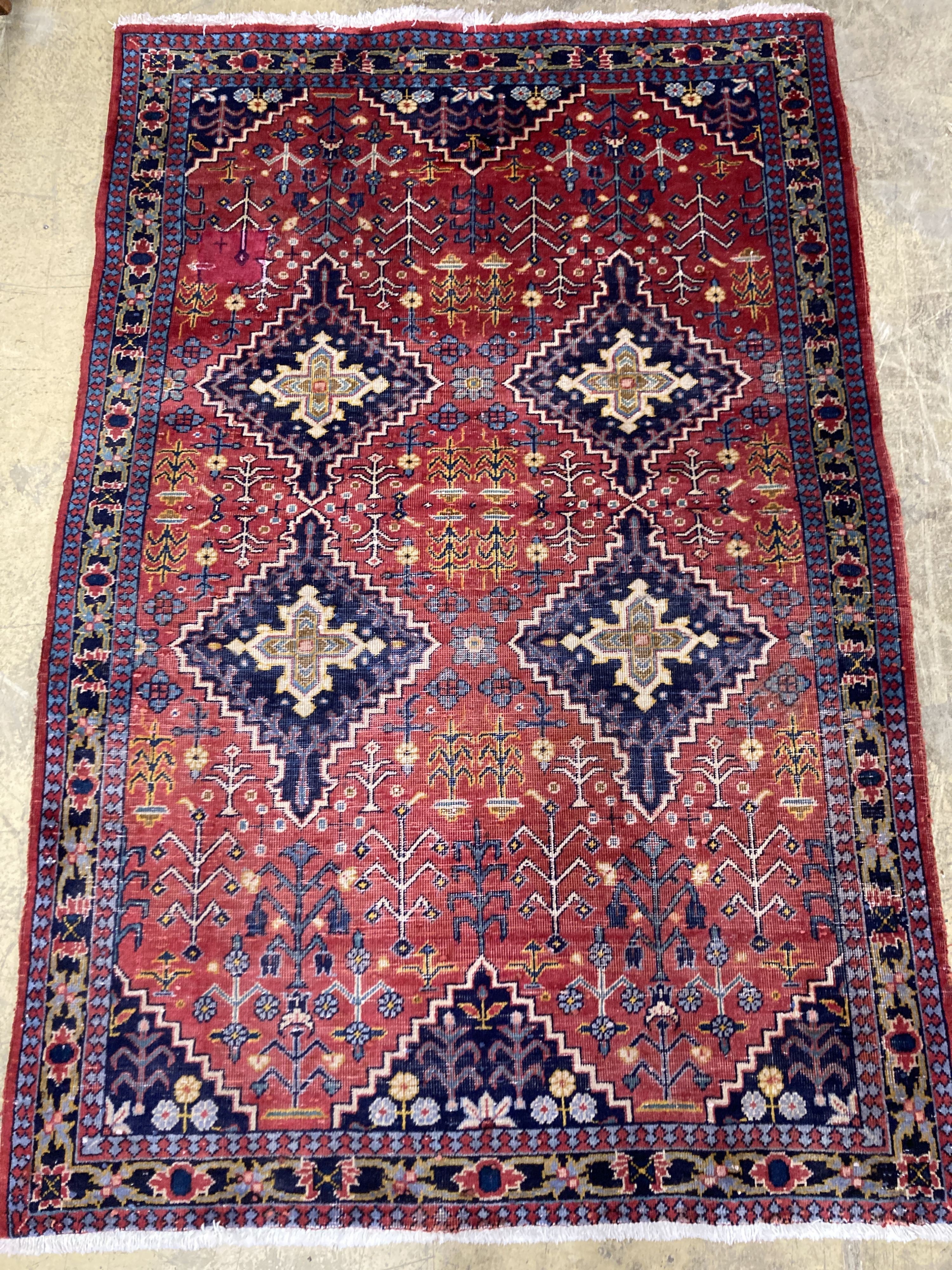 A Caucasian design red ground rug, 206 x 134cm together with a smaller West Persian design rug